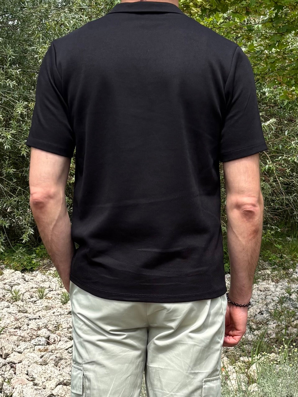 Polo Noir Col ouvert souple