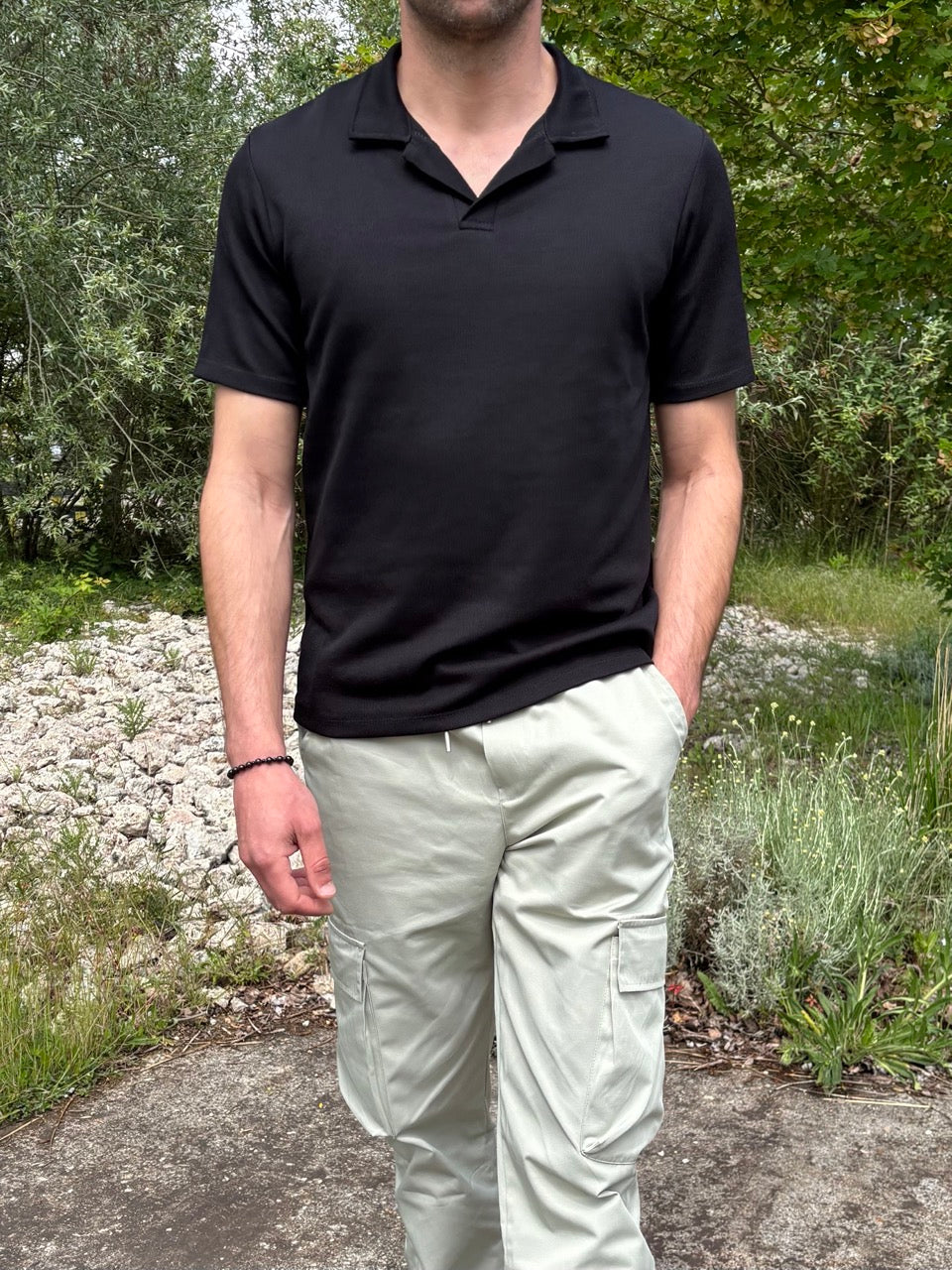 Polo Noir Col ouvert souple